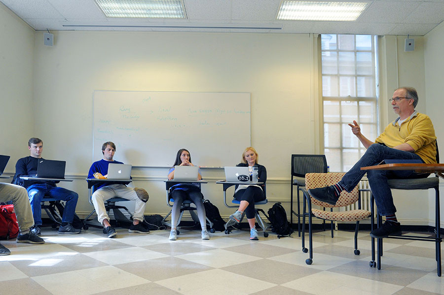 J. Ross MacDonald Professor Daniel Wallace teaches creative writing, which has long been a popular minor, but will become a new major concentration as well this fall. (photo by Donn Young)