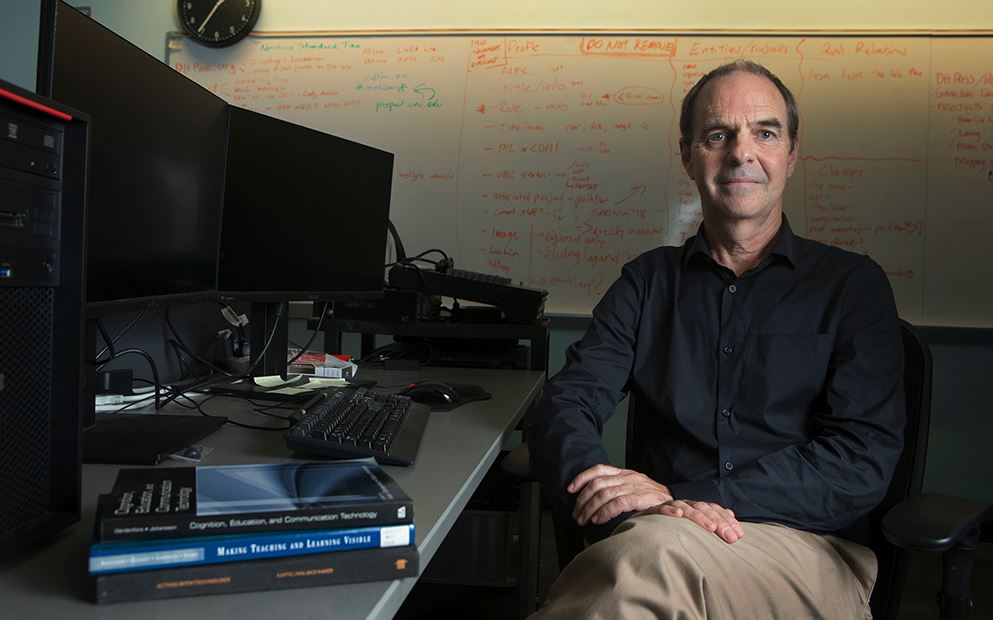 English and comparative literature professor Daniel Anderson pictured in his office.(photo by Megan May)