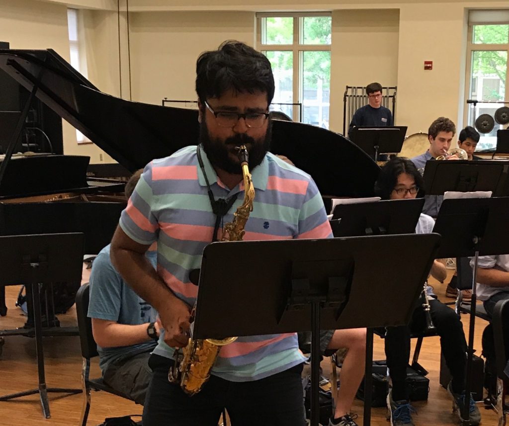 Arvind Mallikarjunan plays the saxophone.