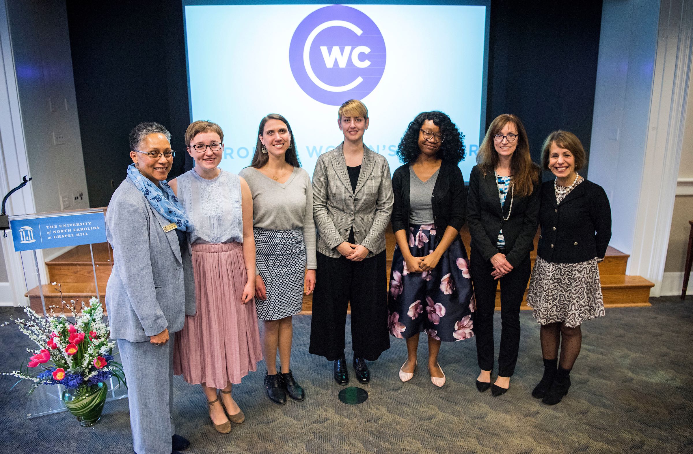 Pictured from left to right: Gloria Thomas, Director of the Carolina Women's Center Undergraduate: Emily Hagstrom Grad student (shared): Katrina Morgan and Francesca Bernardi Staff: Erica Wallace Faculty: Marcey Waters Chancellor Carol Folt University Awards for the Advancement of Women. Held at the Pleasants Family Assembly Room in Wilson Library on the campus of the University of North Carolina at Chapel Hill. March 5, 2018. (Jon Gardiner/UNCCH-Chapel Hill)