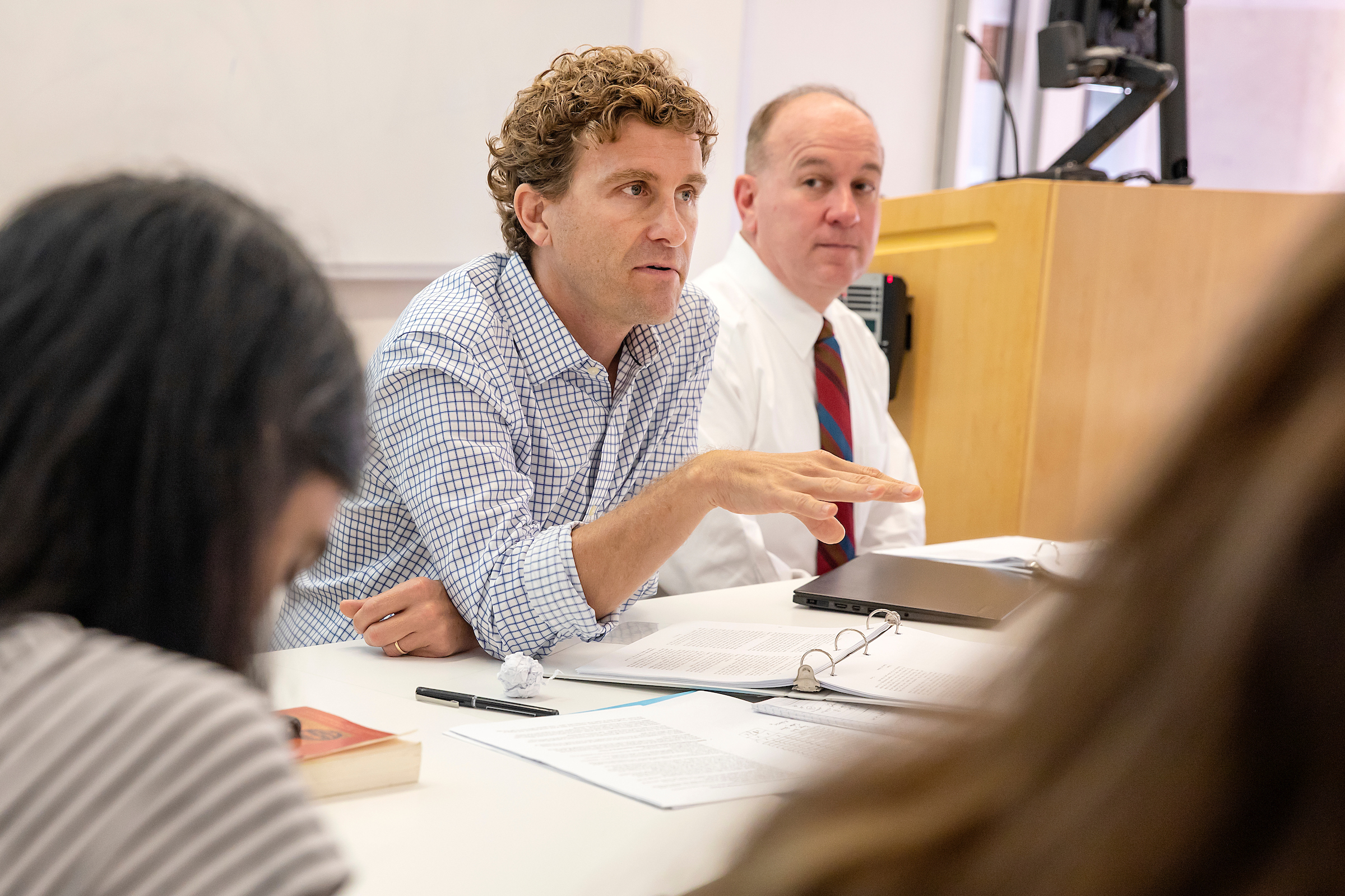 Undergraduate students attend the "Time and Medieval Cosmos" course taught by Professor Chris Clemens (right), of the department of physics and astronomy, and Associate Professor Brett Whalen (left), of the department of history. (photo by Johnny Andrews)