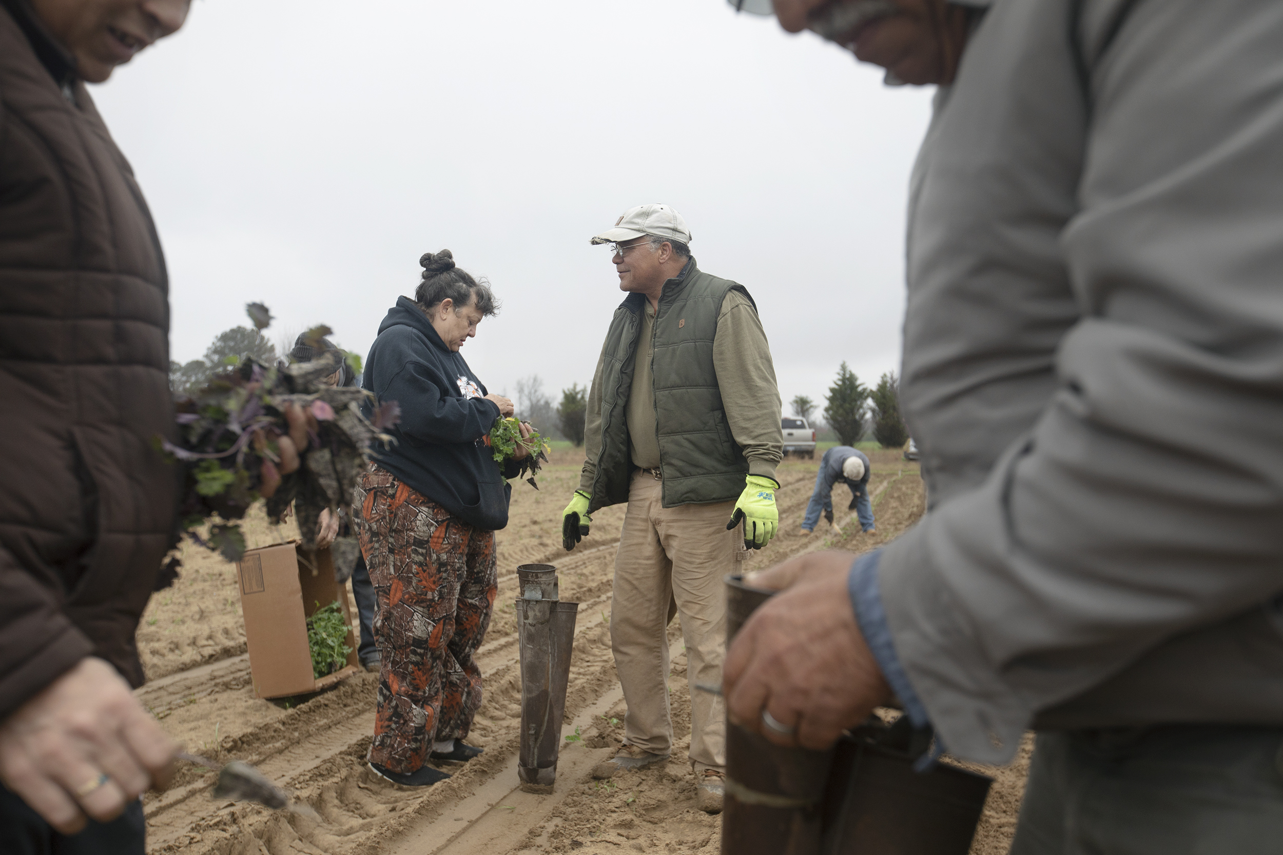 Coharie tribe members and volunteers plant community garden