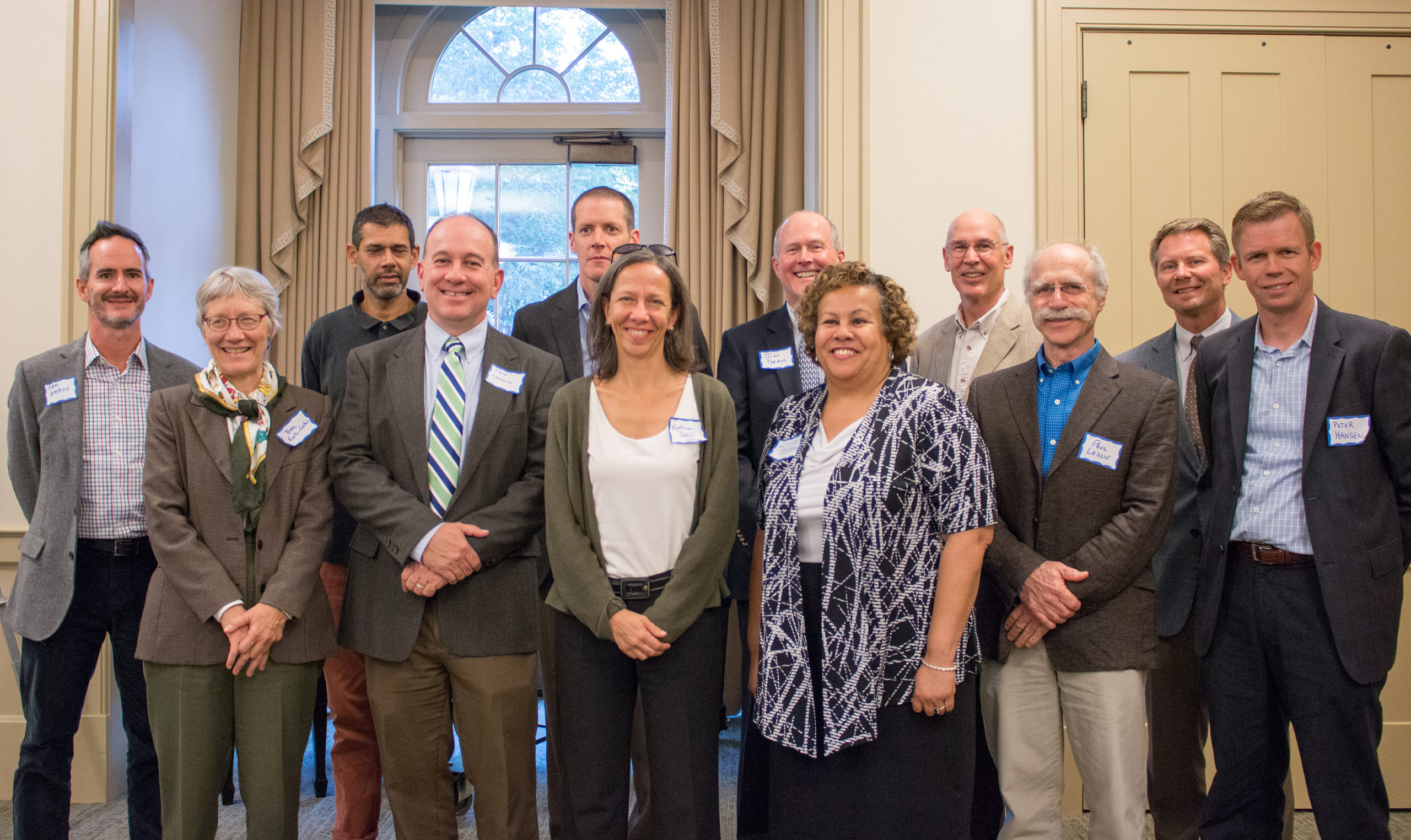 From left: Samuel Amago, Beth Kurtz-Costes, Ashu Handa, Chris Clemens, Bob Goldstein, Kathleen DuVal, provost Jim Dean, Louise Toppin, John McGowan, Paul Leslie, Kevin Guskiewicz, Peter Hansen. Not pictured: L.A. (Laurie) Paul and Benjamin Mason Meier. (photo by Kristen Chavez)