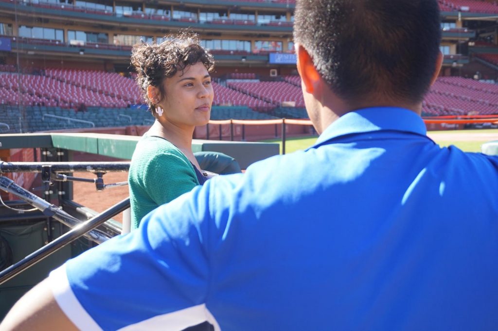 Edwina Koch '17 (left), shown on the baseball field,pitched her Paris business venture at Saint Louis University’s Pitch and Catch Competition.