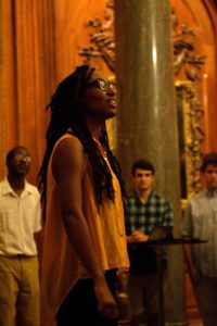 Ashley Harris, a regular contributor to Event Horizon, performs science-themed slam poetry at the magazine's launch event. Photo by Jacob Rosenberg.