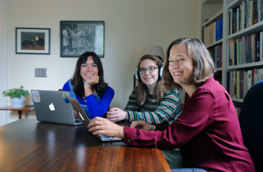 From left, undergraduate students Sydney Lopez and Liv Linn and SOHP director Rachel Seidman at the Center for the Study of the American South. (photo by Donn Young)