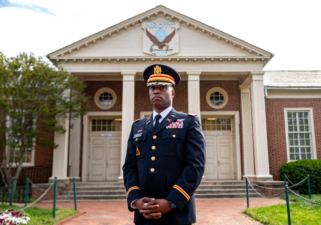 Shane Doolan is Commander of the UNC U.S. Army Reserve Officers’ Training Corps and Chair of the Department of Military Science. (photo by Jon Gardiner) He stands, in uniform, in front of the ROTC building on campus.