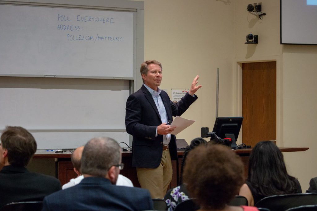 College faculty meeting covers topics from convergent science to public humanities
