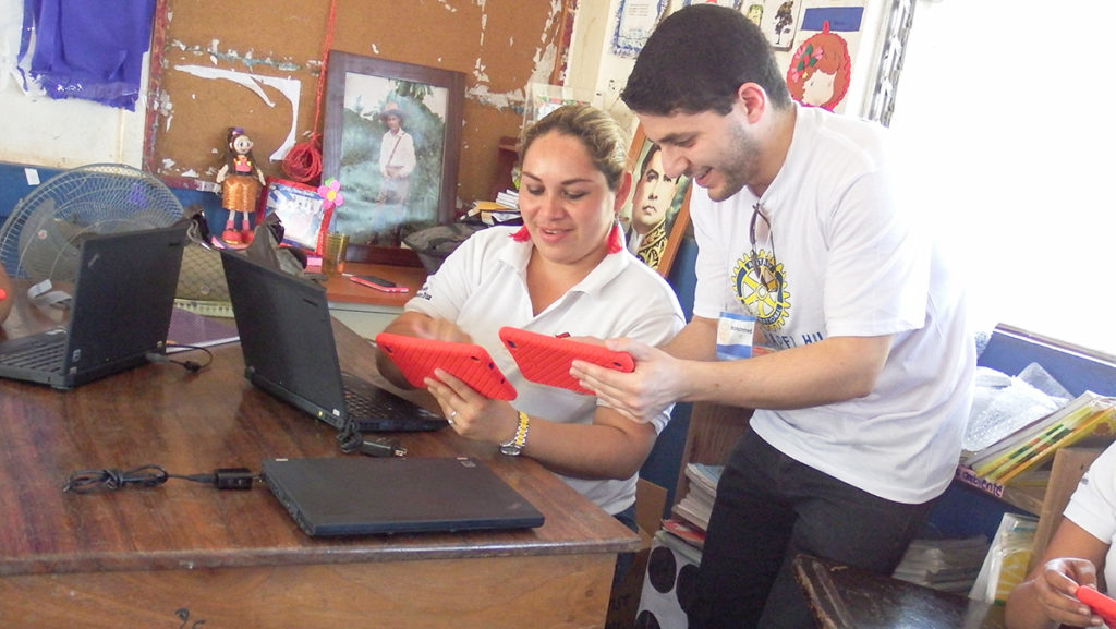 Mohammed Eid training teachers to use tablets. Mohammed Eid training teachers at Trinidad Norte School to use a tablet during a service trip to Nicaragua.