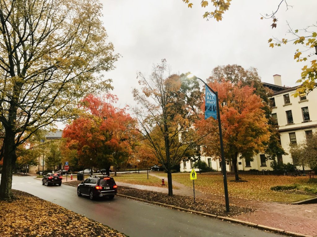Fall pic showing colors on campus and the sign "For All Kind" pic is on Cameron Avenue