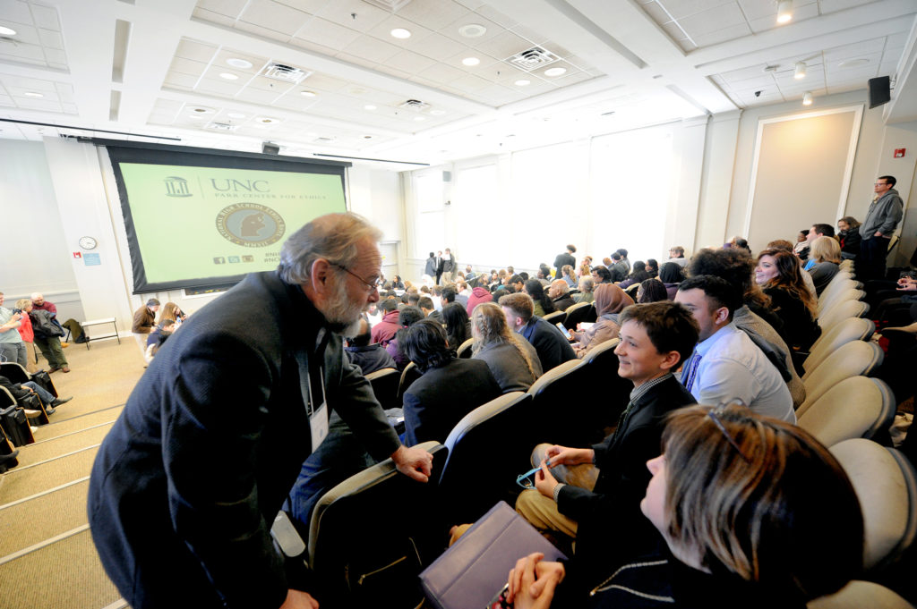 Professor Geoff-Sayre McCord talks to audience members at the Ethics Bowl. (photo by Donn Young)