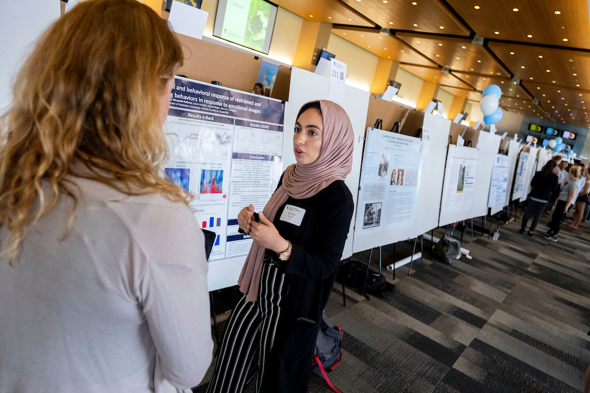 Rawan Ajeen presents her work at the annual Undergraduate Research and Making Expo (Jon Gardiner/UNC-Chapel Hill)