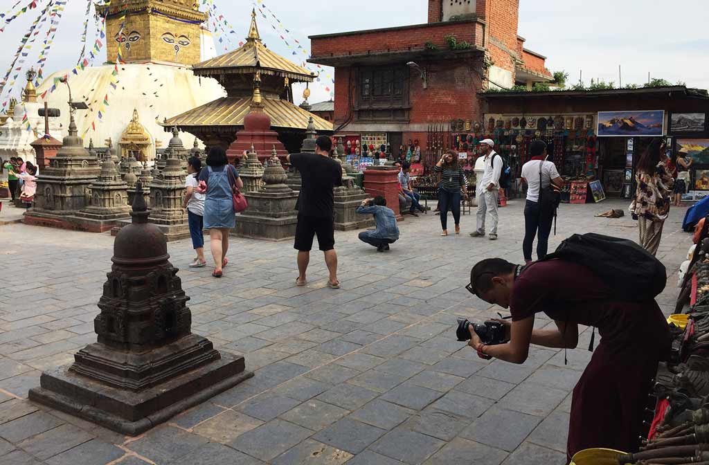 Workshop participants spread out across the religious sites, selecting signature architecture and photographing them from every angle. (photo by Lauren Leve)