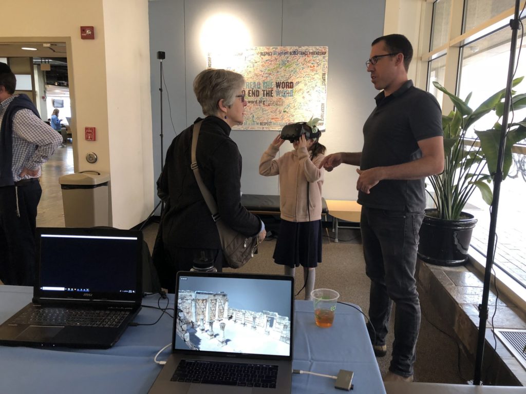 - Brad Erickson showing community members his virtual reality program that allows users to walk through models of ancient synagogues.