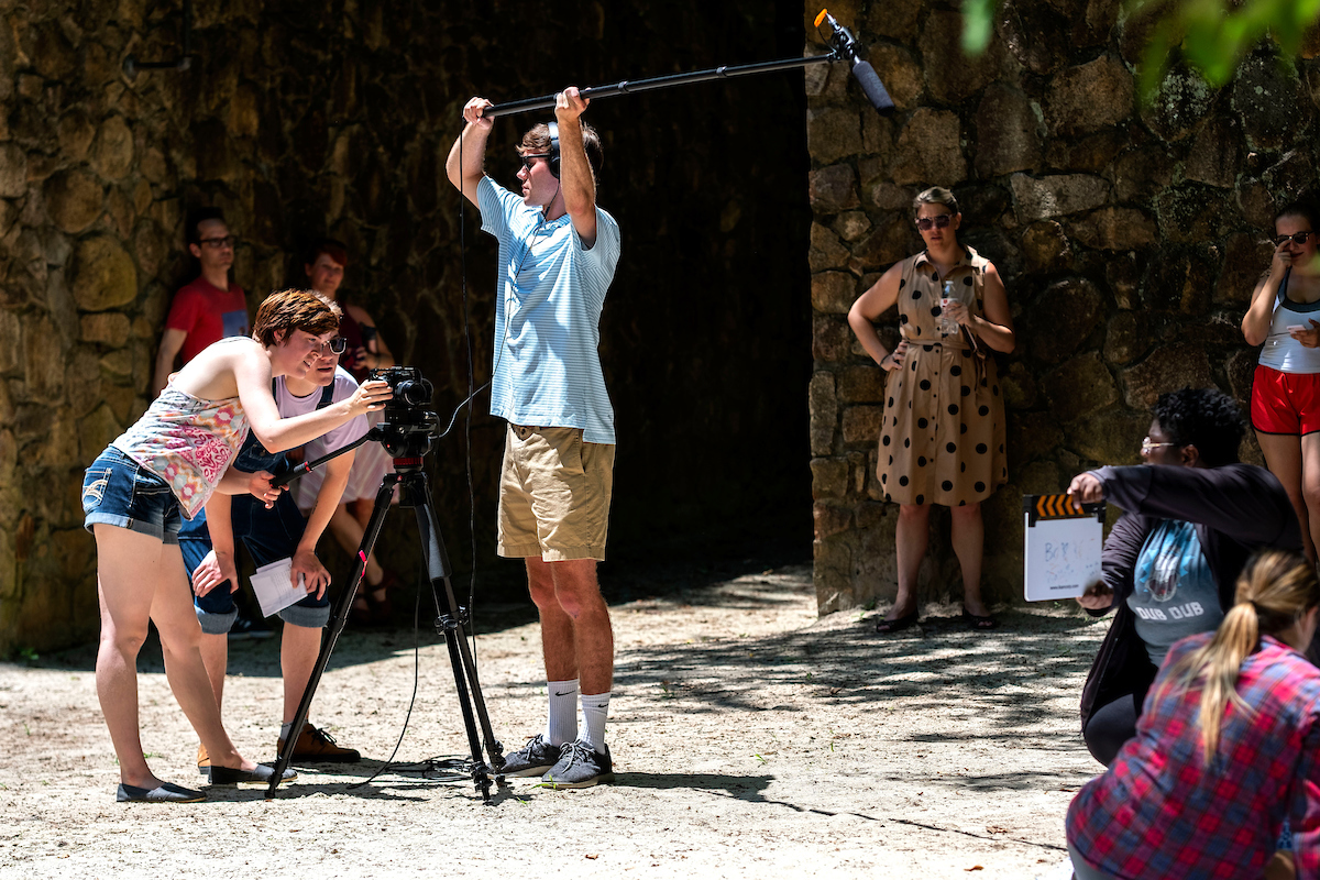 During Maymester’s courses on acting for the camera and directing, students and instructors work on a scene for a final-project film in Carolina’s Forest Theatre. (Jon Gardiner/UNC-Chapel Hill)