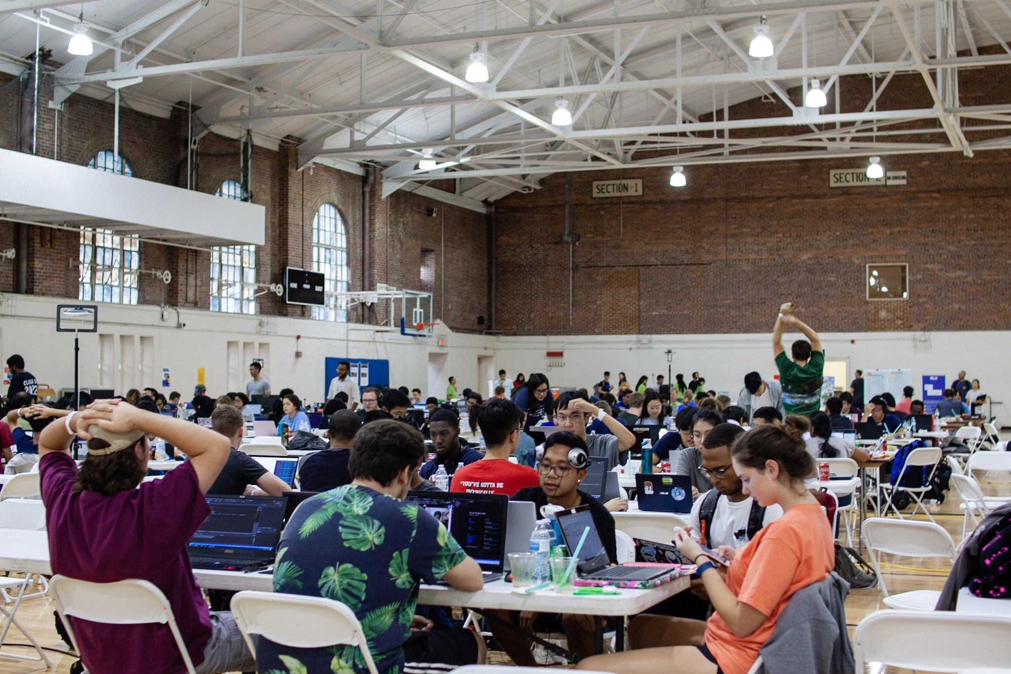 HackNC 2019 competitors work on projects in Woollen Gym. (photo by Austin Wang)